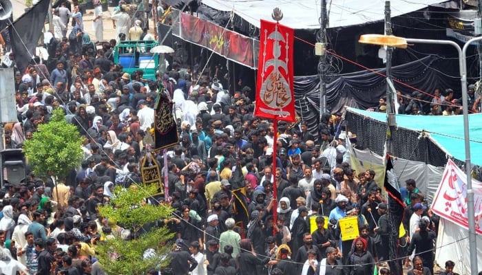 A large number of mourners attending the procession on 9th of the Holy Month of Muharramul Haram passing through Mumtazabad, Multan on June 25, 2026. — APP