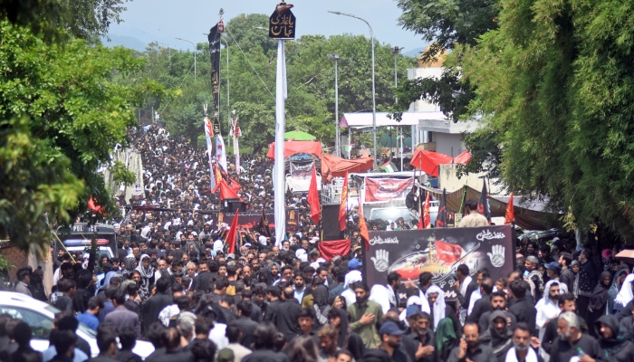 Mourners participate in a Muharram procession on the ninth of Muharram-ul-Haram at Markazi Asna Ashri Imam Bargah G-6/2 in Islamabad, June 26, 2026. — Online