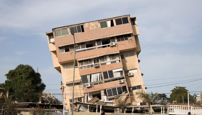 Picture of a leaning building taken after twin earthquakes in Caraballeda, La Guaira State, some 40 km northeast of Caracas, on June 25, 2026. — AFP