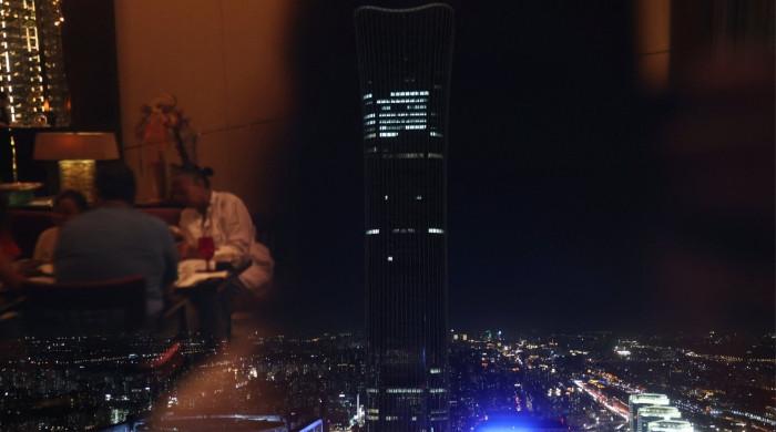 Plane debris seen at Beijing's tallest building: witness