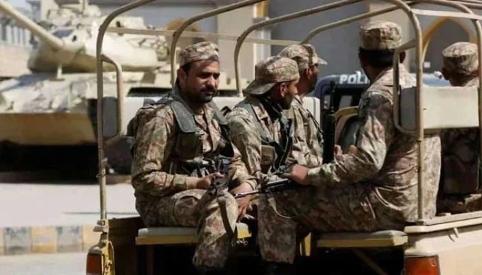 Security personnel stand guard in Bajaur district of Khyber Pakhtunkhwa. — AFP/File