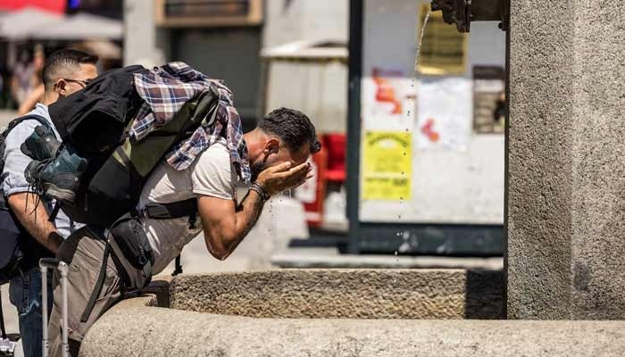 A man refreshed himself during a heatwave in Chamonix, France, June 25, 2026. — Reuters