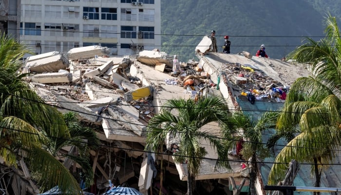 A damaged building is seen from the base camp of the French Civil Security Training and Intervention Regiment (UIISC 7) at the Karting La Guaira complex in Caraballeda, La Guaira state, Venezuela, June 27, 2026. — Reuters
