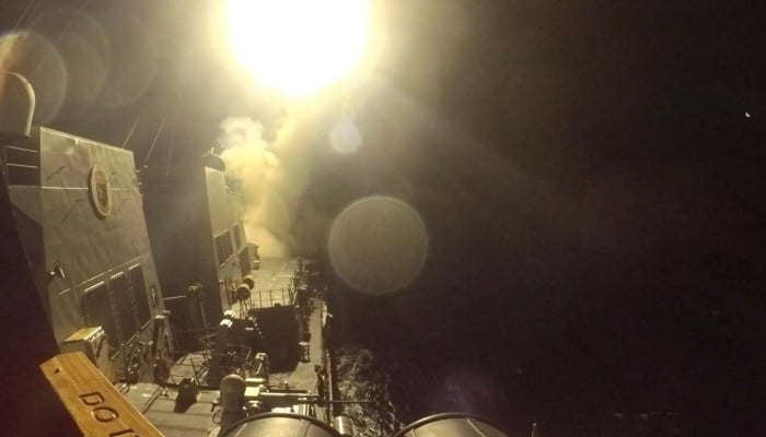 USS Michael Murphy (DDG 112) launches Tomahawk cruise missiles from an unknown location, as the United States launched new strikes against multiple targets overnight in Iran in this still image obtained from a handout video released on June 10, 2026. — Reuters