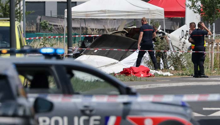Rescuers work at the site of a plane crash in Tomblaine, France, June 28, 2026. — Reuters