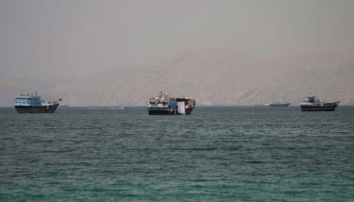 Vessels at the Strait of Hormuz, as seen from Musandam, Oman, June 22, 2026. — Reuters