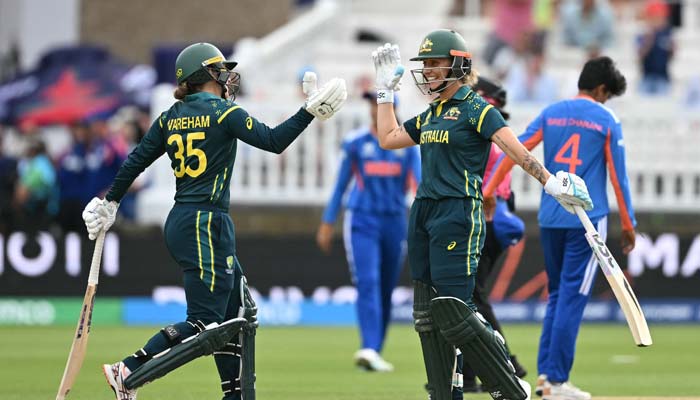 Australias Georgia Wareham (left) and Australia´s Ashleigh Gardner celebrate after beating India in the ICC Women´s T20 cricket world cup 2026 game between Australia and India, at Lord´s in London on June 28, 2026. — Reuters