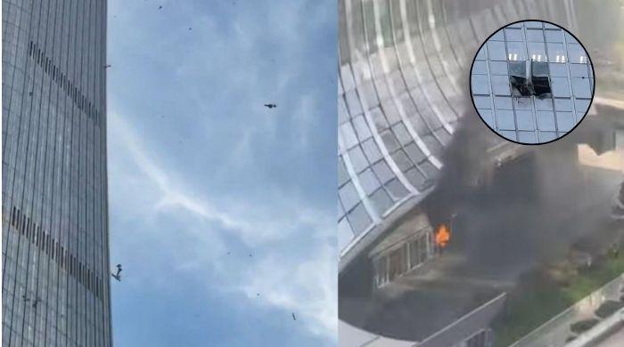 Mystery grows after plane hits Beijing's tallest building leaving one dead, 13 injured