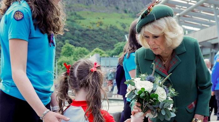 Queen Camilla receives flowers as new claims emerge over strict Sussex rules