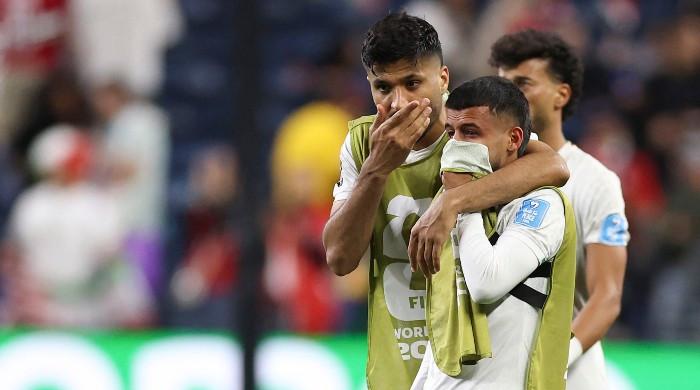 Austria draw with Algeria in World Cup thriller to progress and send Iran home