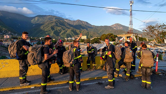 Members of the French Civil Security Training and Intervention Regiment (UIISC 7) attend an area affected by building collapses in La Guaira state, Venezuela, on June 28, 2026, following earthquakes. — AFP