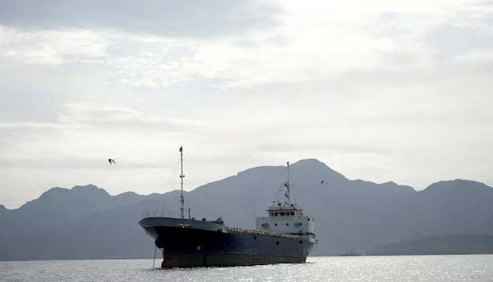 A vessel in the Strait of Hormuz, off the coast of Oman’s Musandam province, April 12, 2026. — Reuters