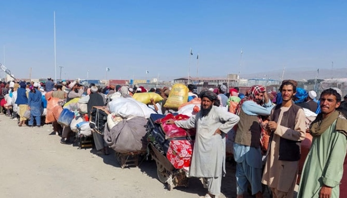 Afghan citizens wait with their belongings to cross into Afghanistan at Friendship Gate of Chaman Border Crossing along the Pakistan-Afghanistan Border in Chaman, Balochistan, October 31, 2023. — Reuters