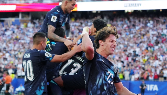 Paraguays Matias Galarza and teammates celebrate winning the penalty shootout as Paraguay qualify for the round of 16 stage of the World Cup. — Reuters