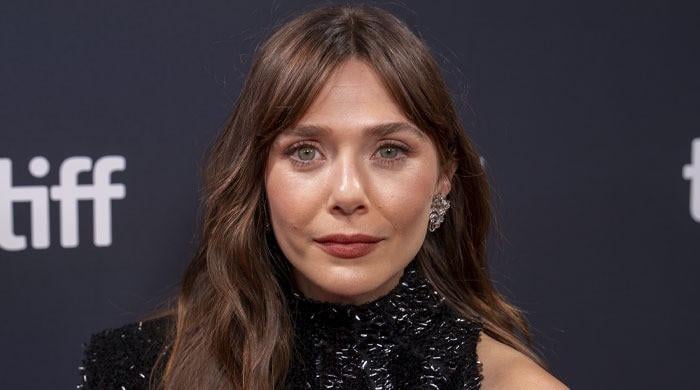 Elizabeth Olsen offers new glimpse of growing baby bump