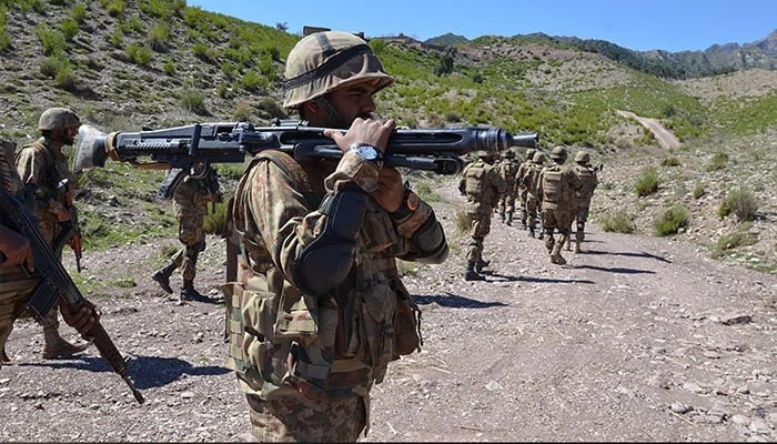 The security personnel are seen busy in an operation. — ISPR/File