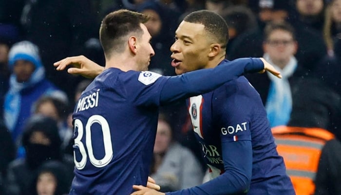 Kylian Mbappe celebrates with Lionel Messi against Olympique de Marseille on February 26, 2023. — Reuters