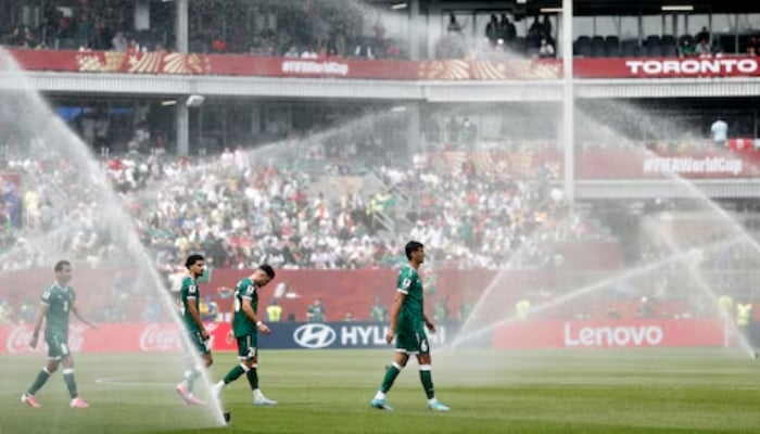 Iraqs Munaf Younus with teammates as the pitch is watered by sprinklers during a hydration break  in Fifa World Cup 2026  Group I match between Senegal and Iraq at Toronto Stadium, Toronto, Canada, June 26, 2026. — Reuters