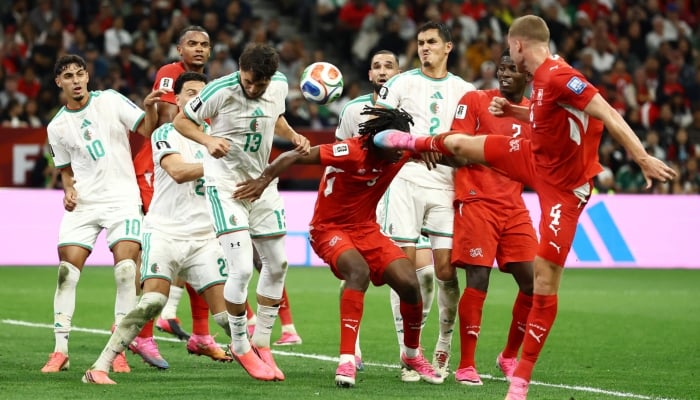 Algerias Jaouen Hadjam in action with Switzerlands Johan Manzambi and Nico Elvedi in Fifa World Cup 2026 Round of 32 match between Switzerland and Algeria at BC Place, Vancouver, Canada, July 2, 2026. — Reuters