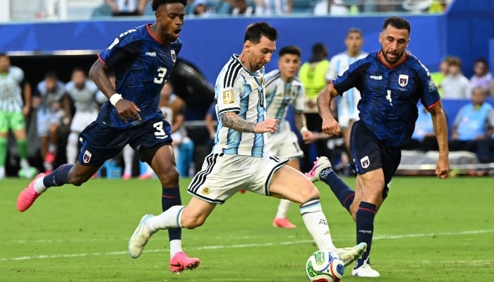 Cape Verdes defender #03 Diney Borges, Argentinas forward #10 Lionel Messi and Cape Verdes defender #04 Pico Lopes fight for the ball during the 2026 World Cup round of 32 football match between Argentina and Cape Verde at the Miami Stadium in Miami Gardens on July 3, 2026. — AFP