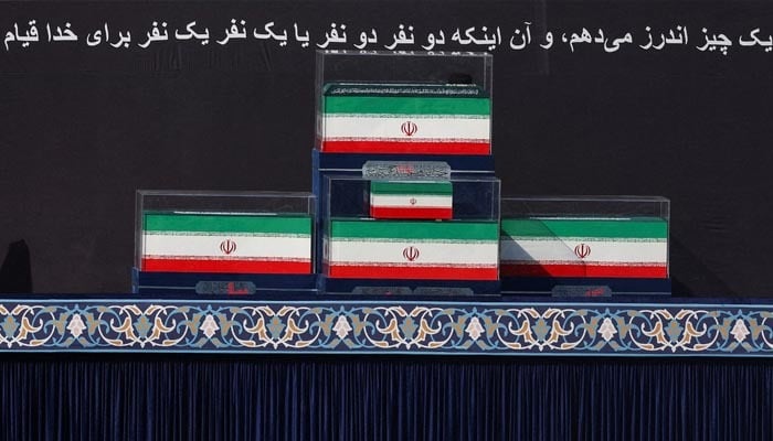 The coffins of Irans late Supreme Leader Ayatollah Ali Khamenei and his family members in the colours of Iranian flags and a portrait of late leader of the Islamic Revolution, Ayatollah Ruhollah Khomeini, on the stage, as people gather for a public farewell ceremony to pay their respects to late Supreme Leader Ayatollah Ali Khamenei, who was assassinated on February 28 in Israeli and US airstrikes, at the Imam Khomeini Grand Mosalla, in Tehran, Iran July 4, 2026. — Reuters