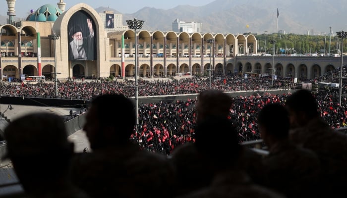 A banner with an image of late Supreme Leader Ayatollah Ali Khamenei is displayed as people gather on the day of a public farewell ceremony to pay their respects to Khamenei, who was martyred on February 28 in Israeli and US airstrikes, at the Imam Khomeini Grand Mosalla, in Tehran, Iran July 4, 2026. — Reuters