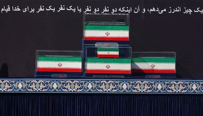 The coffins of Irans late Supreme Leader Ayatollah Ali Khamenei and his family members in the colours of Iranian flags and a portrait of late leader of the Islamic Revolution, Ayatollah Ruhollah Khomeini, on the stage, as people gather for a public farewell ceremony to pay their respects to late Supreme Leader Ayatollah Ali Khamenei, who was assassinated on February 28 in Israeli and US airstrikes, at the Imam Khomeini Grand Mosalla, in Tehran, Iran July 4, 2026. — Reuters