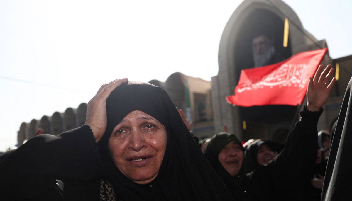 A woman reacts as mourners gather on the day of a public farewell ceremony to pay their respects to late Supreme Leader Ayatollah Ali Khamenei, who was assassinated on February 28 in Israeli and US airstrikes, at the Imam Khomeini Grand Mosalla, in Tehran, Iran July 4, 2026.— Reuters