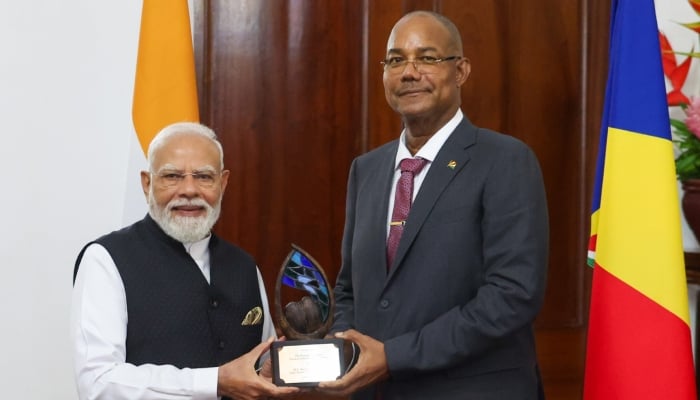 Indian PM Narendra Modi receive the Guardian of the Blue Horizon award from Seychelles President Patrick Herminie, June 28, 2026. — X/@narendramodi