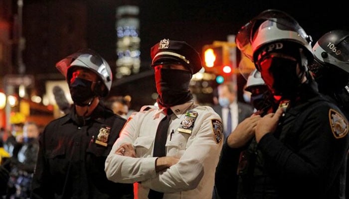 Members of the New York Police Department (NYPD) watch a Black Lives Matter protest in Manhattan, New York City, US. — Reuters/File
