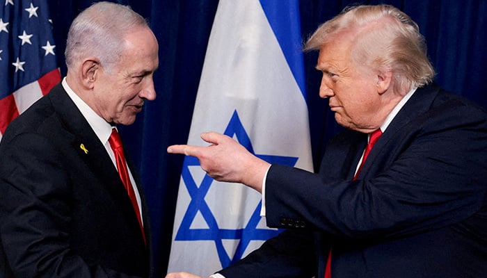 US President Donald Trump points his finger towards Israeli Prime Minister Benjamin Netanyahu as they shake hands during a press conference after meeting at Trump’s Mar-a-Lago club in Palm Beach, Florida, US, December 29, 2025. — Reuters