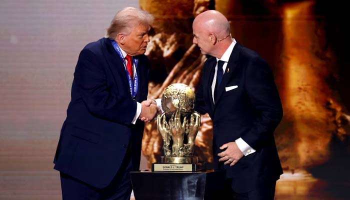 Fifa President Gianni Infantino presents United States President Donald Trump with the Fifa Peace Prize during the World Cup 2026 Final Draw at John F Kennedy Centre for the Performing Arts.— Reuters