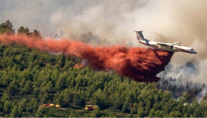 Wildfire in France burns 11,000 acres as Europe battles its third heatwave