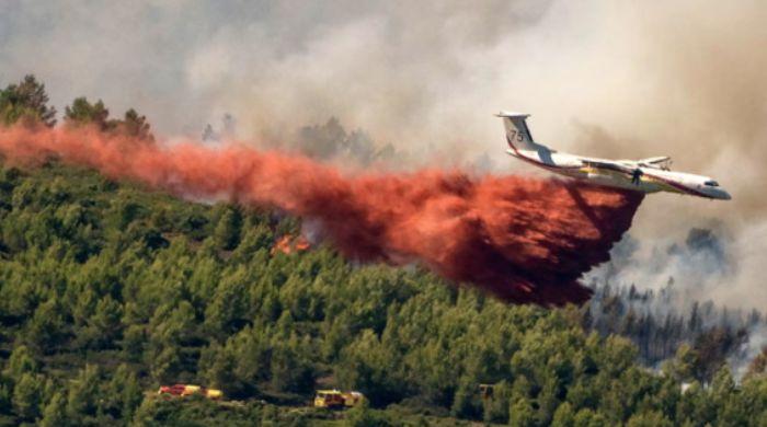 Wildfire in France burns 11,000 acres as Europe battles its third heatwave