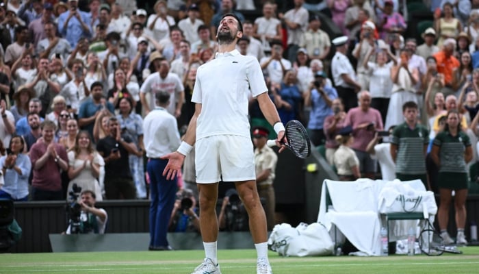 Serbias Novak Djokovic celebrates after winning his quarter final match against Canadas Felix Auger-Aliassime on July 7, 2026. — Reuters