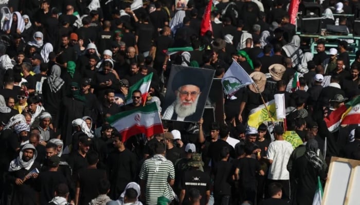 People attend a funeral procession for Iran’s late Supreme Leader Ayatollah Ali Khamenei, who was killed on February 28 in Israeli and US air strikes, in Karbala, Iraq, July 8, 2026. — Reuters