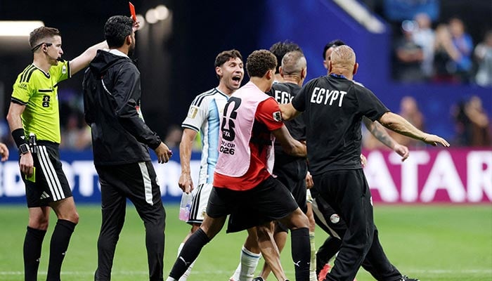 A member of Egypts coaching staff is shown a red card by referee Francois Letexier during Egypts Round of 16 clash against Argentina at Atlanta Stadium, Atlanta, Georgia, US, July 7, 2026. — Reuters