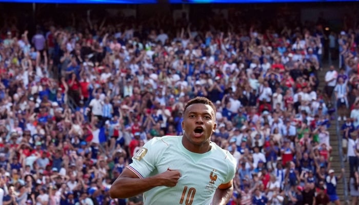 Frances Kylian Mbappe celebrates scoring their first goal on July 9, 2026. — Reuters