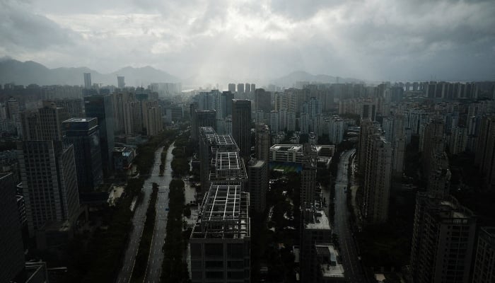 Rain clouds cover downtown as Typhoon Bavi approaches, in Wenzhou, Zhejiang province, China July 11, 2026. — Reuters