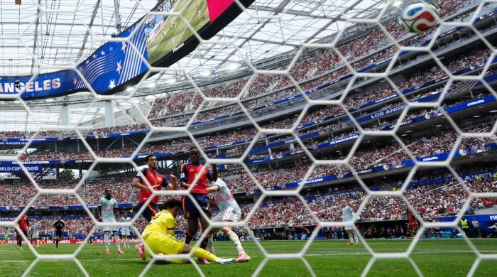 Spain edge Belgium to reach World Cup semi-finals