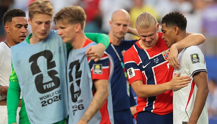 Norways Erling Haaland embraces Englands Jude Bellingham after the World Cup quarter-final at Miami Stadium in Miami Gardens, Florida, on July 11, 2026, as England advance to the semi-finals. — Reuters