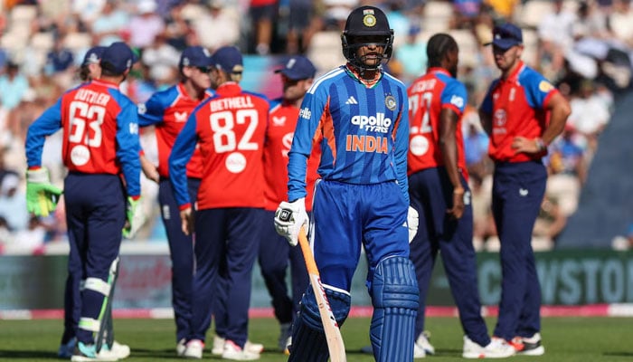 Indias Abhishek Sharma walks after losing his wicket, caught by Englands Jos Buttler off the bowling during Fifth T20 International match in  Utilita Bowl, Southampton, Britain on July 11, 2026. — Reuters