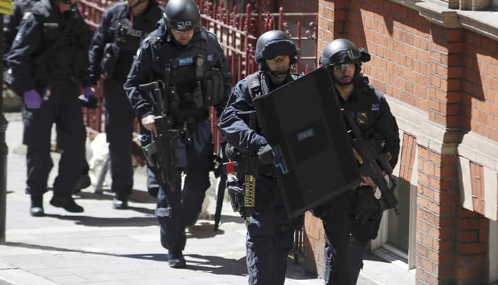 London Metropolitan Police take part in Exercise Strong Tower, removing actors as casualties from the scene of a mock terror attack at a disused underground station in central London, Britain June 30, 2015. — Reuters