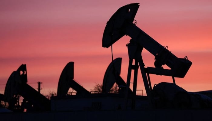 Sunset clouds glow over pump jacks at the Airankol oil field operated by Caspiy Neft in the Atyrau region, Kazakhstan, April 21, 2026. — Reuters