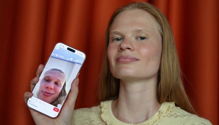 Anastasia Kostromitina, who has gone viral with striking likeness to Norways Erling Haaland, poses in Moscow, Russia, July 10, 2026. — Reuters