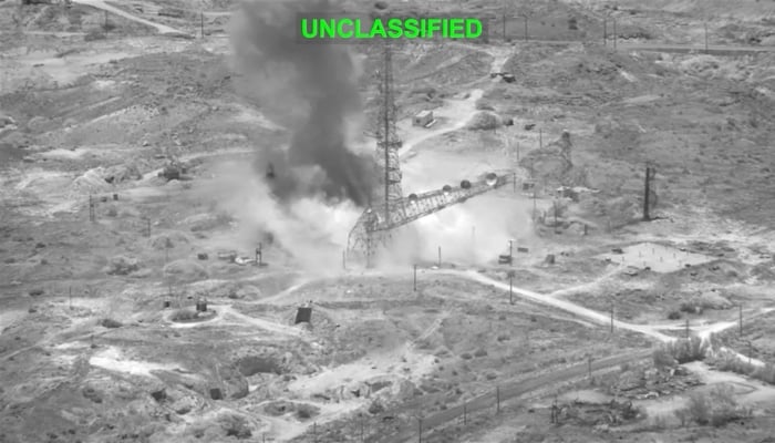 Smoke rises from an explosion at an unknown location, during what US Centcom says are strikes on Iran, in this screen grab taken from a handout video released on July 15, 2026.  — Reuters