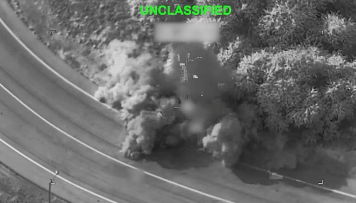 Smoke rises following a strike at an unknown location during what the US military says is its latest wave of strikes on Iran, hitting Iranian military targets such as coastal surveillance and air defence sites, military logistics infrastructure, and maritime capabilities, in this still image taken from handout video released July 16, 2026.— Reuters