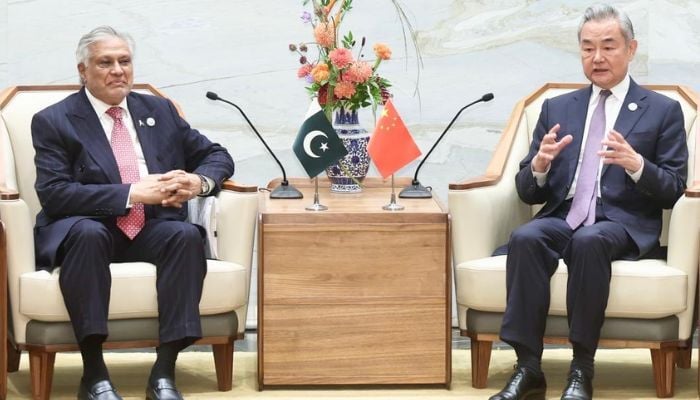 Deputy Prime Minister/Foreign Minister Senator Mohammad Ishaq Dar with Chinese Foreign Minister Wang Yi in Shanghai, China, on the margins of WAIC, July 16, 2026. — X/@ForeignOfficePk