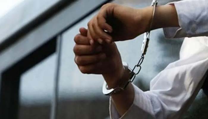 This undated image shows a pair of hands in handcuffs. — Reuters
