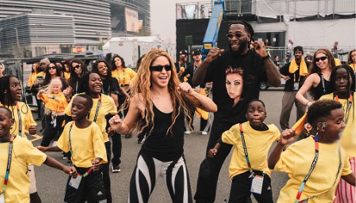 Burna Boy spins Shakira in air as Dai Dai hits new milestone